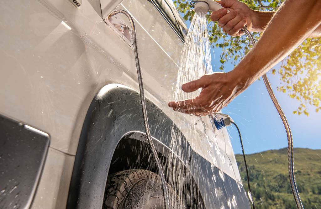 RV fresh water tank being sanitized with household bleach solution