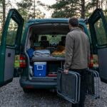 Comfortable campervan camping chairs beside a scenic campsite in the USA